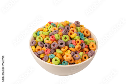 Colorful rings cereal spill out into a bowl. Breakfast. Isolated.