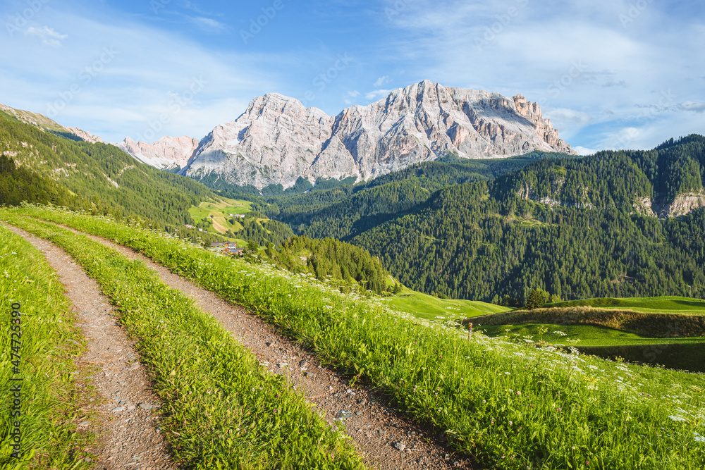 The Dolomites of Val Badia in the late afternoon of a summer day near the village of 