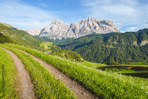 The Dolomites of Val Badia in the late afternoon of a summer day near the village of "La val", Italy - August 2021