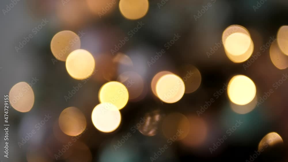 bokeh effect new year Christmas tree with garlands and balloons is at home