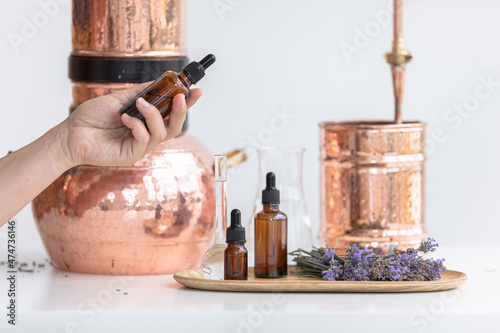 Tablou pe pânză Distillation of lavender essential oil