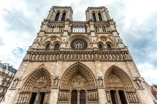 Facade of the Notre Dame cathedral in Paris, France, Europe