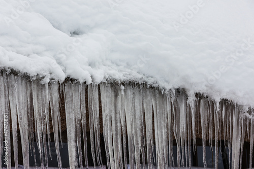 icicle on roof of the ice house in the winter © ImagineDesign