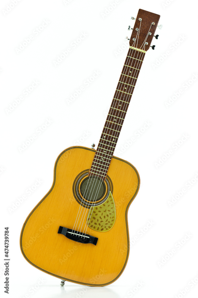 Obraz premium A guitar isolated on a white background.