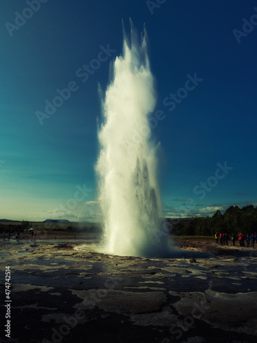 Strokkur geyser in Iceland in a sunny summer day