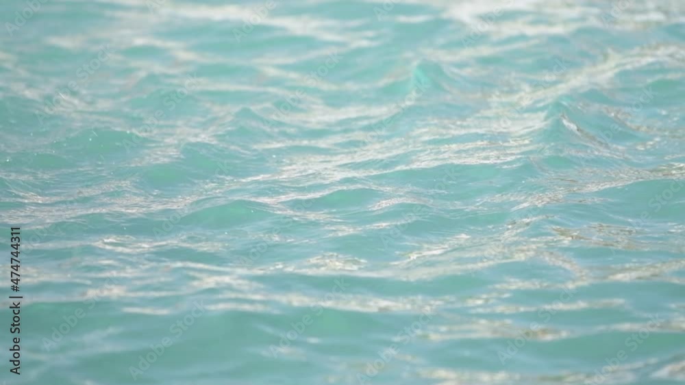 Blue clean swimming pool water surface in slow motion Blue clean swimming pool water surface in slow motion