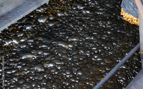 Copper concentration plant. Ore flotation and processing. Close-up of fine pulp with bubbles. Khromtau, Kazakhstan 