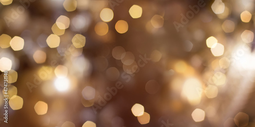 Panoramic golden luxury bokeh light background