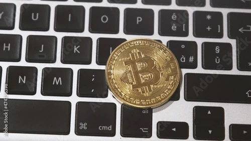 Crypto coin on laptop keyboard