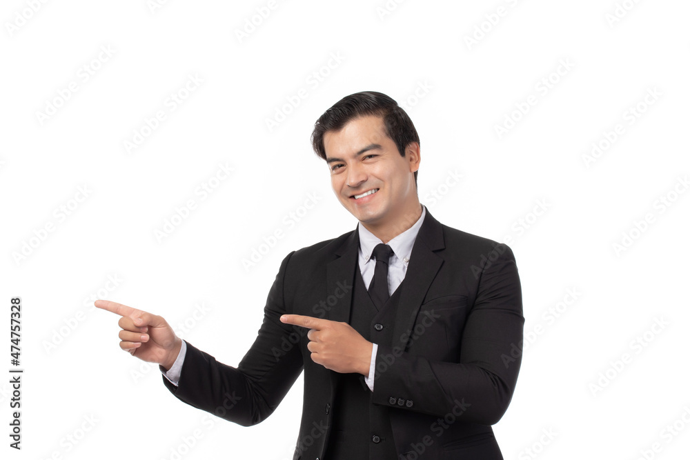Portrait of a confident business man in black suit smile and pointing to copy space isolated on white background. Portrait business concept. Portrait of a confident business man in black suit smile and pointing to copy space isolated on white background. Portrait business concept.