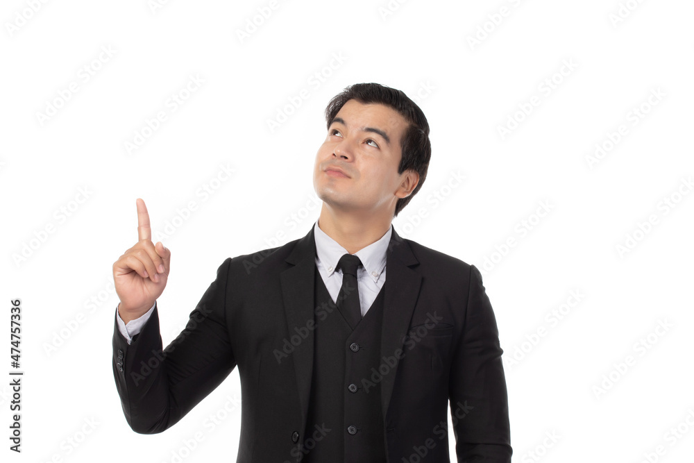 Portrait of a confident business man in black suit smile and pointing to copy space isolated on white background. Portrait business concept. Portrait of a confident business man in black suit smile and pointing to copy space isolated on white background. Portrait business concept.
