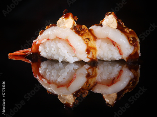 classic Sushi on Black Background nigiri sushi with reflection on black background close-up