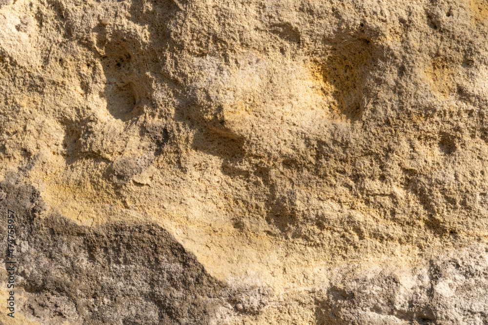Close up view of sandstone rock formation outdoors. Natural sandstone texture and background Close up view of sandstone rock formation outdoors. Natural sandstone texture and background