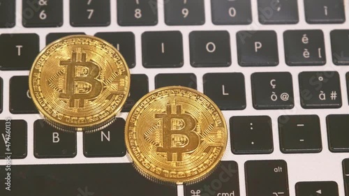 Crypto coin on laptop keyboard
