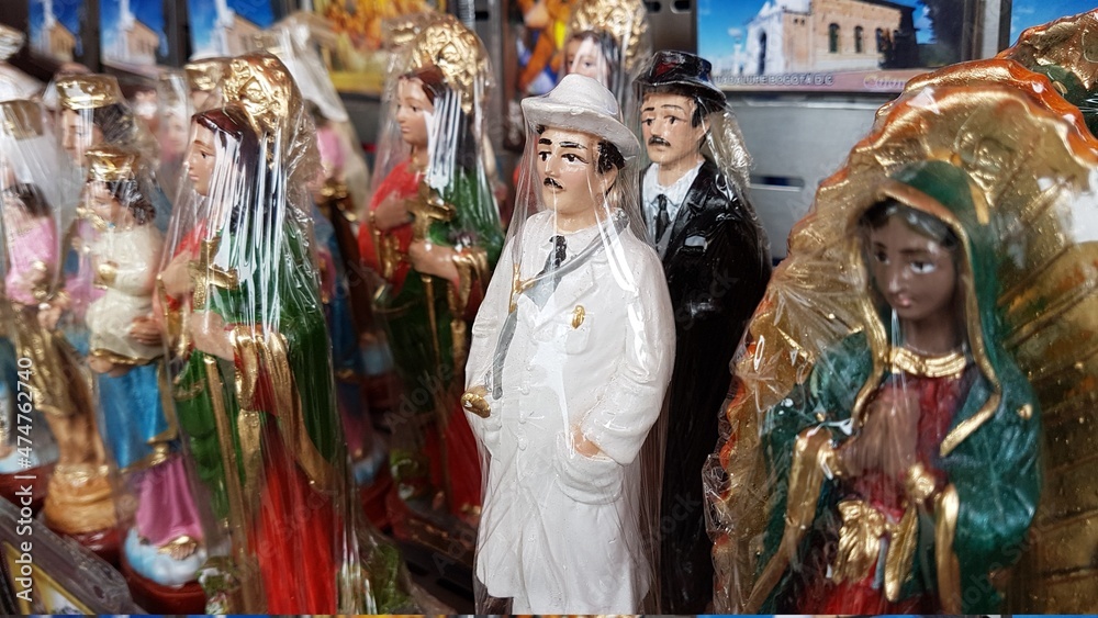 Little statues of Blessed Jose Gregorio Hernandez and other catholic devotions
