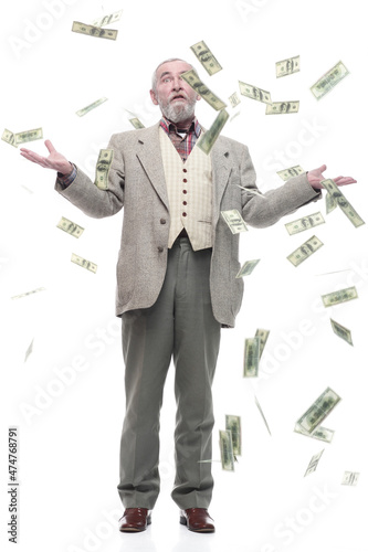 in full growth. elderly business man with banknotes .