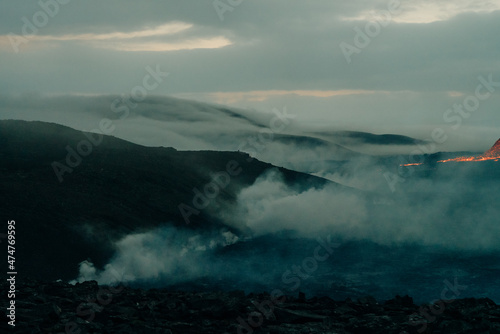 Obraz na plátně tourist looks at Fagradalsfjall, Iceland - June, 2021: volcano eruption near Rey
