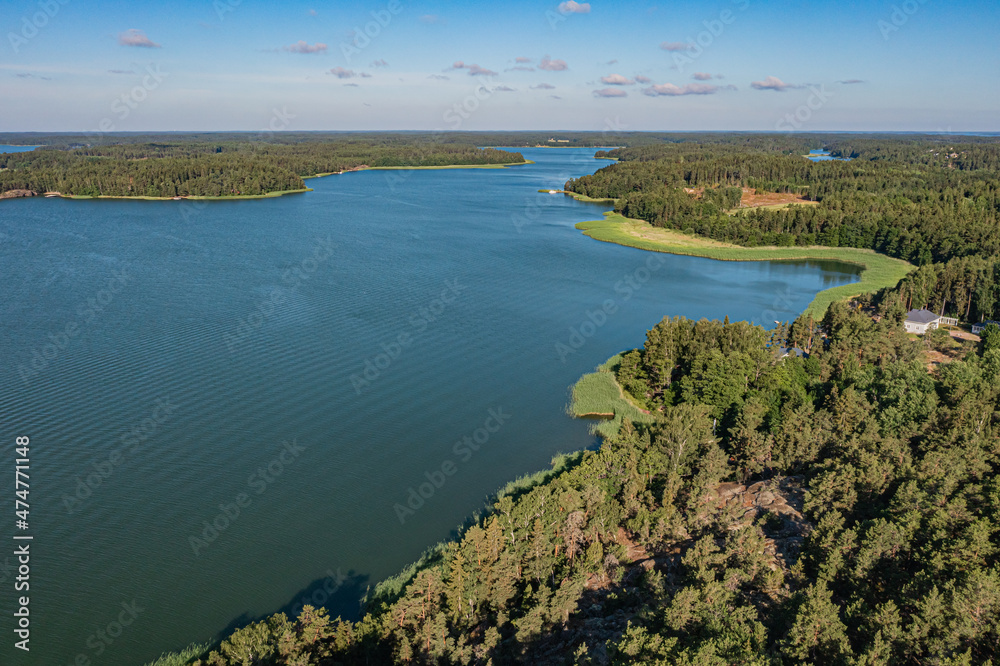Photo from a drone, on a sunny summer day, a view of the islands in the sea. Finland, Turku. Nature and landscape of Scandinavia