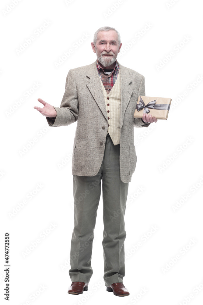 in full growth. happy business man with a gift box. in full growth. happy business man with a gift box.