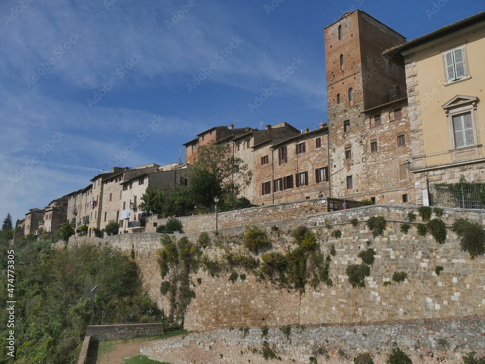 Panorama of Colle di Val d'Elsa from the Sapia bulwark and the cobblestone street along the city walls leading to the modern neighborhood of the village