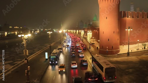 time lapse of traffic at night on the Kremlyovskaya embankment near the Kremlin, Moscow, Russia