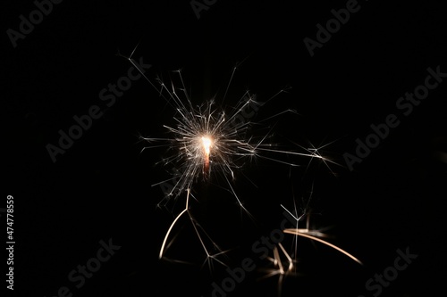 Sparkler. Abstract background for Christmas and Happy New Year 2022.