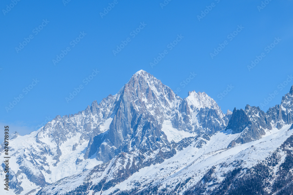 The Aiguille Verte and the Aiguille du Dru in the Mont Blanc massif in Europe, France, the Alps, towards Chamonix, in spring, on a sunny day.