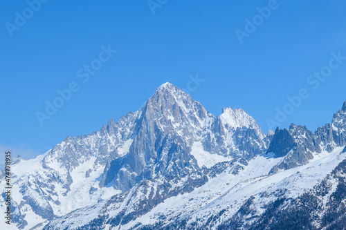 The Aiguille Verte and the Aiguille du Dru in the Mont Blanc massif in Europe, France, the Alps, towards Chamonix, in spring, on a sunny day. © Florent