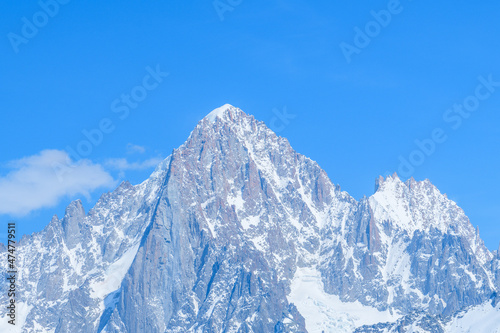 The close-up on the Aiguille Verte and the Aiguille du Dru in the Mont Blanc massif in Europe, France, the Alps, towards Chamonix, in spring, on a sunny day. © Florent
