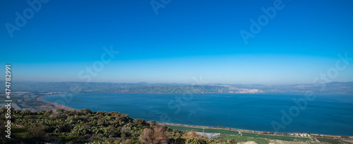 View of the south part of the Sea of Galilee as seen from the Golan heights in Israel. Mount Tabor can also be seen in the distance.