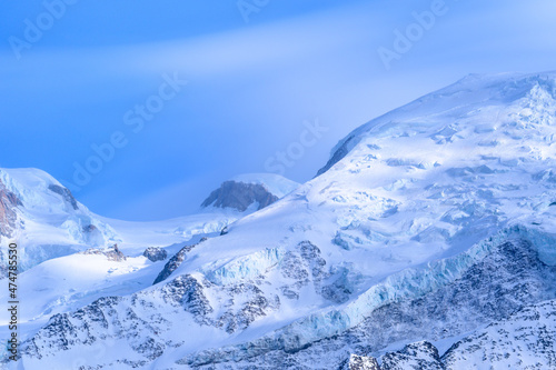 Mont Blanc lit by the Sun in Europe  France  the Alps  towards Chamonix  in spring  on a sunny day.