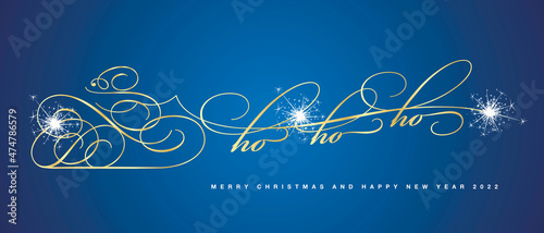 Ho ho ho Merry Christmas and Happy New Year 2022 beautiful golden abstract Santa Claus and Santas Sleigh ride calligraphy white sparkle fireworks blue background greeting card