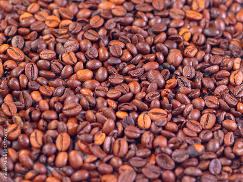 Roasted coffee beans background © JohnyBlack