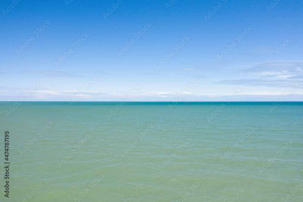 The peaceful Channel Sea in Europe, France, Normandy, towards Ouistreham, in summer, on a sunny day.