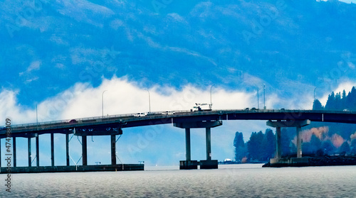 Cars driving across bridge over Okanagan Lake at Kelowna, Okanagan Valley, British Columbia, Canada photo