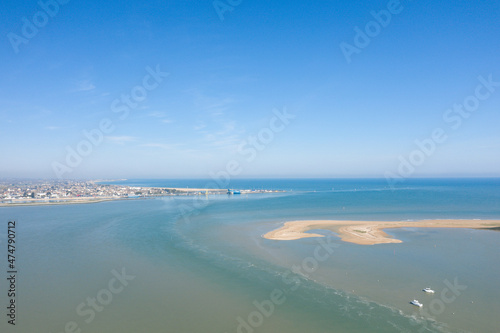 The bay of Orne and the city of Ouistreham in Europe, France, Normandy, in summer on a sunny day.