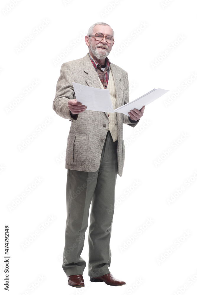 smiling elderly man reading a business document. smiling elderly man reading a business document.
