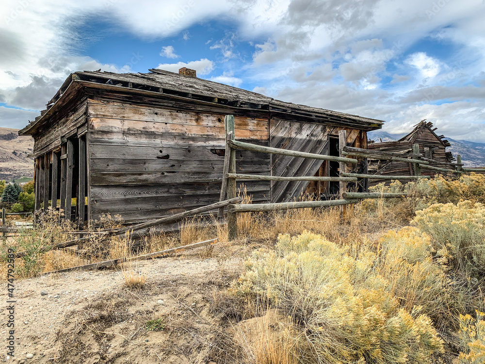 An abandoned farm building in the valley