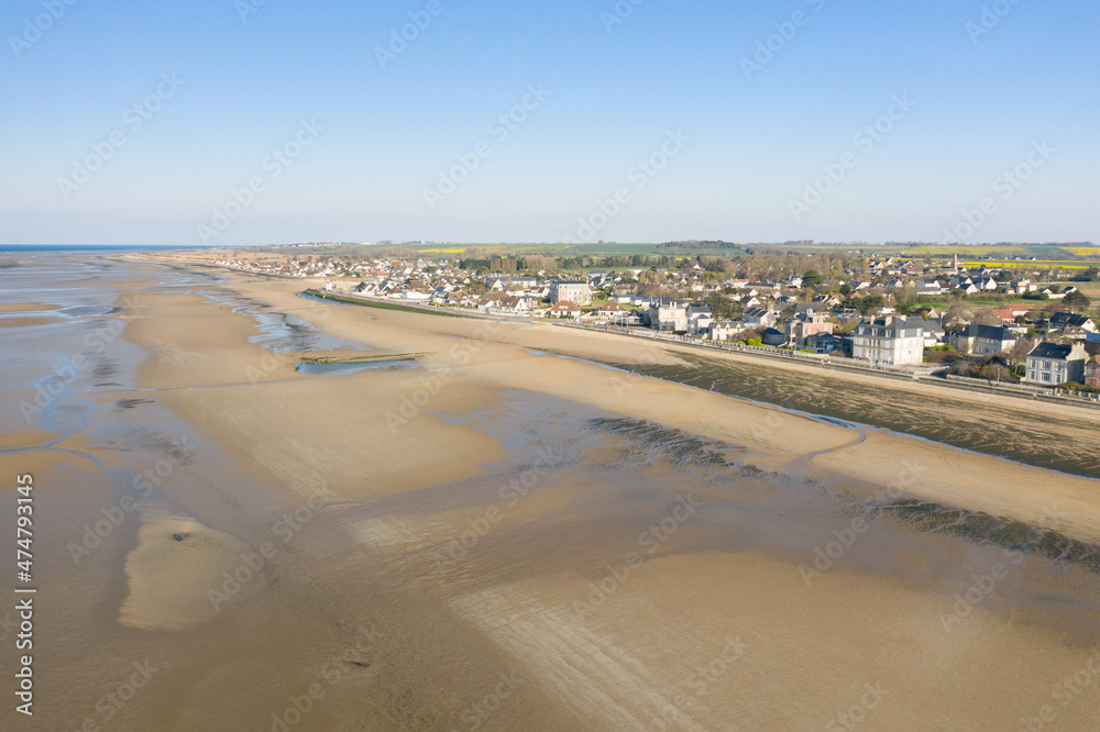 The small town of Asnelle on the beach of Gold beach in Europe, France, Normandy, towards Arromanches les Bains, in summer, on a sunny day.
