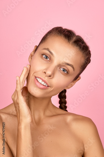 Natural beauty. Beautiful young woman. Smooth skin care concept.