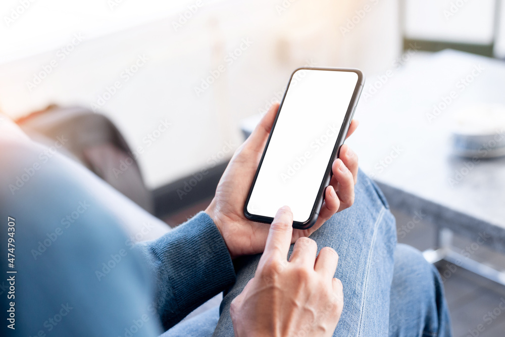cell phone blank white screen mockup.hand holding texting using mobile on desk at office.background empty space for advertise.work people contact marketing business,technology cell phone blank white screen mockup.hand holding texting using mobile on desk at office.background empty space for advertise.work people contact marketing business,technology