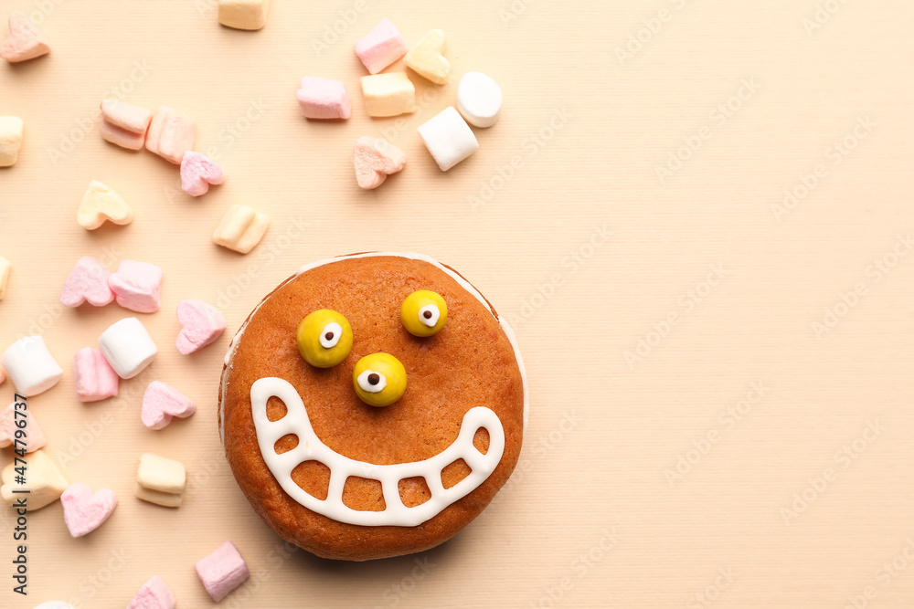 Fototapeta premium Funny cookie with marshmallows on light background