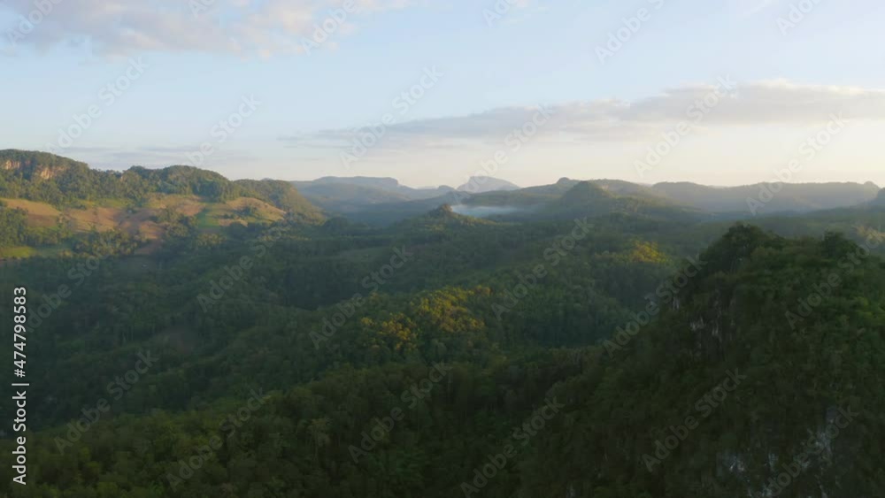 Aerial top view of forest trees and green mountain hills. Nature landscape background, Thailand. Aerial top view of forest trees and green mountain hills. Nature landscape background, Thailand.