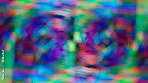 Abstract multicolored glowing blurred background with bokeh
