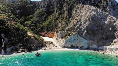 Pristine Water And Forested Cliffs At Agia Eleni Beach In Paliki, Kefalonia Island, Greece. aerial photo