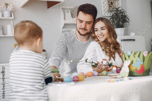 Family with little son in a kitchen