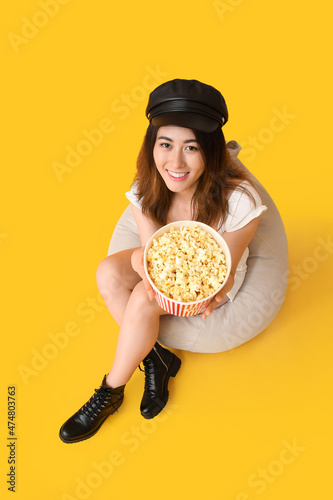 Young Asian woman with tast...