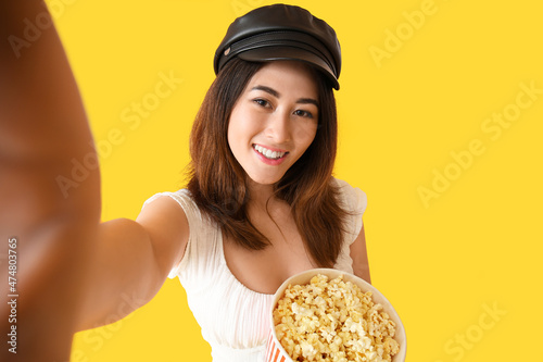 Young Asian woman with tast...