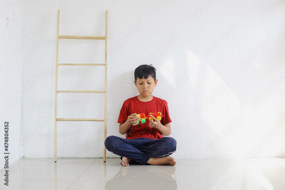 autistic children playing alone