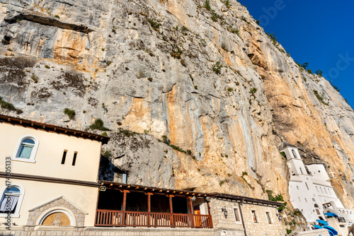 Ostrog lower monastery,main building against the large rock of Ostroska Greda, Montenegro,Eastern Europe. photo